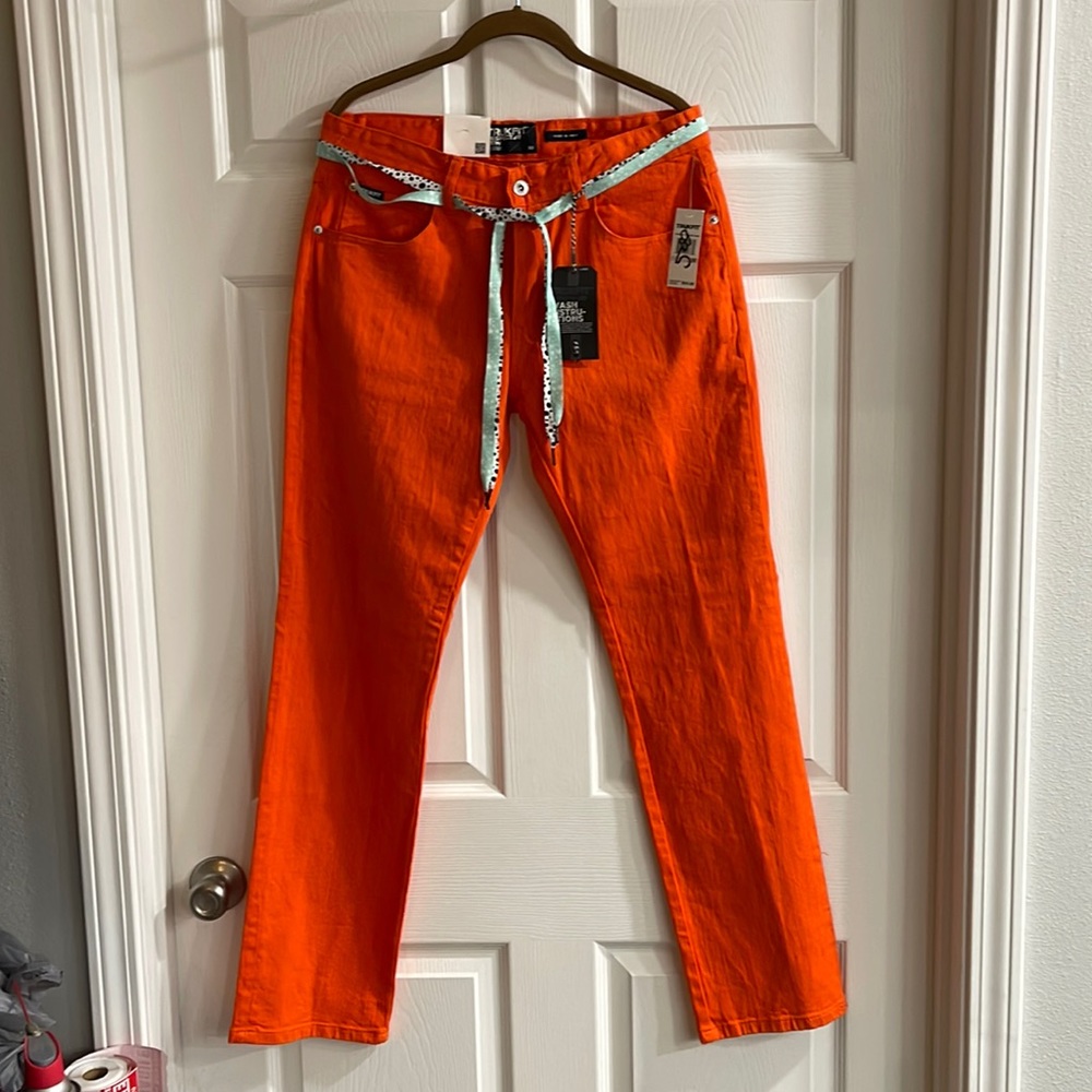 Trunk fit original slim straight fit orange pants. Brand new from Dillards.